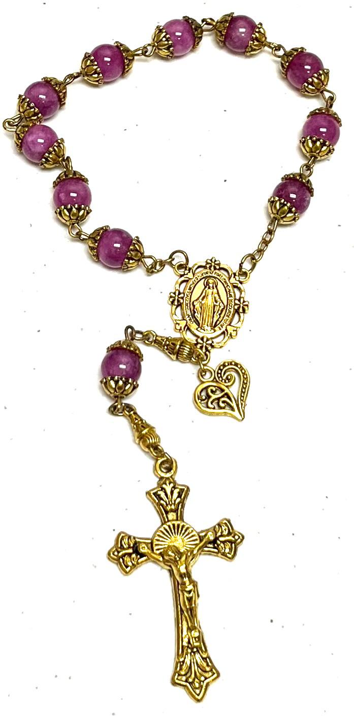 Decenario de Rosario violeta con dorado
