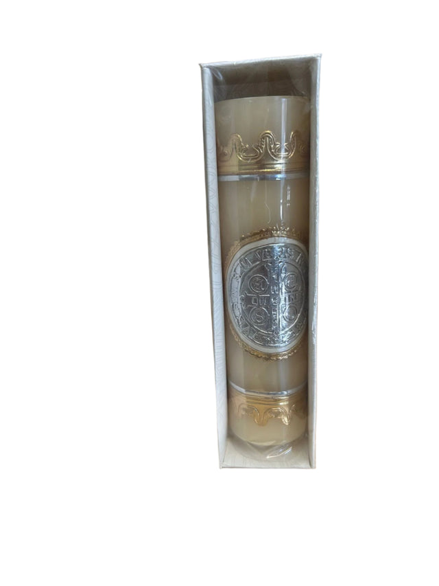 Decorative bottle in a box on a wooden surface with a blurred background