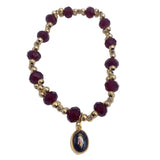GOLD AND COLORFUL BRACELETS WITH DIFFERENT MEDALS