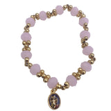 GOLD AND COLORFUL BRACELETS WITH DIFFERENT MEDALS
